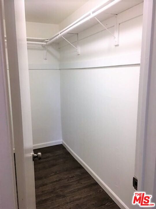 3111 4th Street, Unit 215 Santa Monica, CA 90405 - Photo 5 of 12 a view of a room with wooden floor