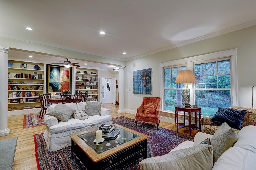83 Rumstick Road Barrington, RI 02806 - Photo 4 of 28 Banks of Bookcases and Hardwood flooring