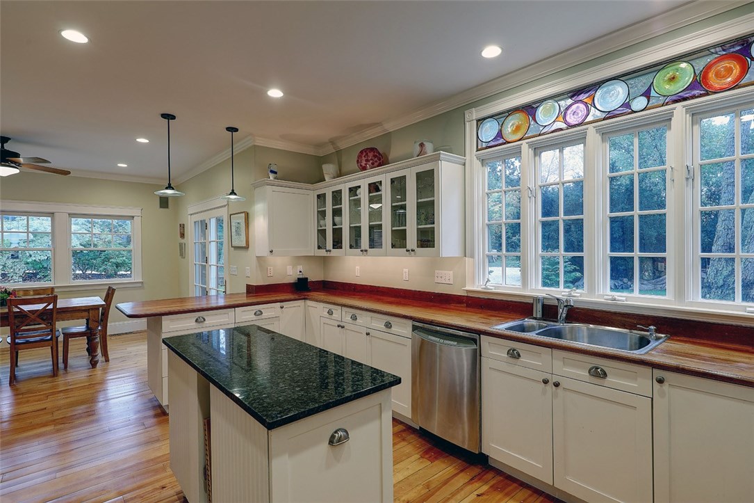 83 Rumstick Road Barrington, RI 02806 - Photo 7 of 28 Sunfilled eat in kitchen with banks of windows