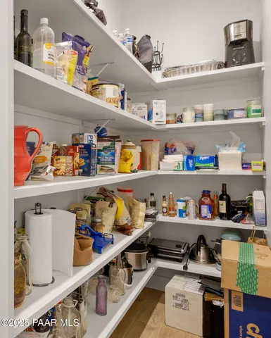 an aerial view of residential houses with a city