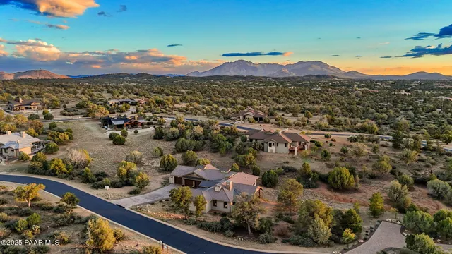 a view of a chairs and tables in a room