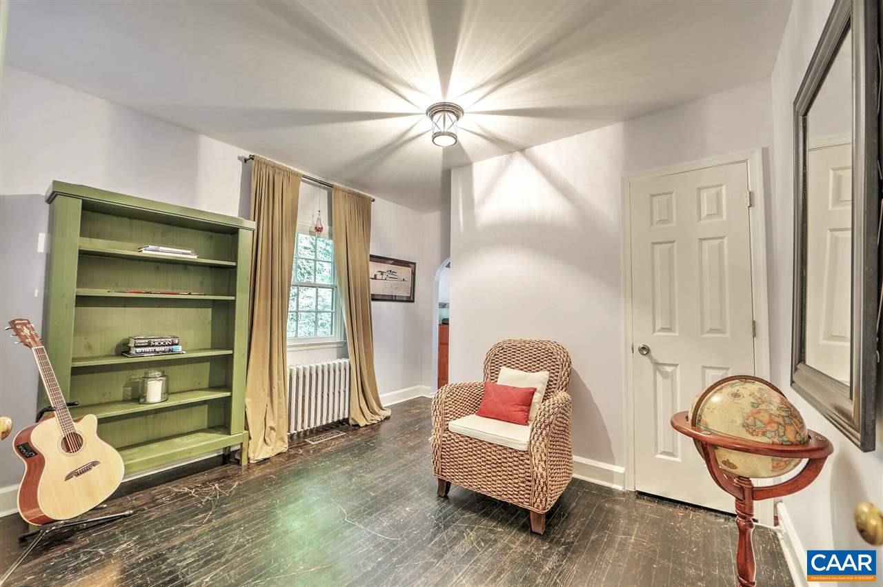 1711 Rugby Avenue Charlottesville, VA 22903 - Photo 12 of 39 a living room with furniture and a window
