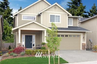 4413 226th Place Southeast Bothell, WA 98021 - Photo 1 of 1 a front view of a house with a yard and trees