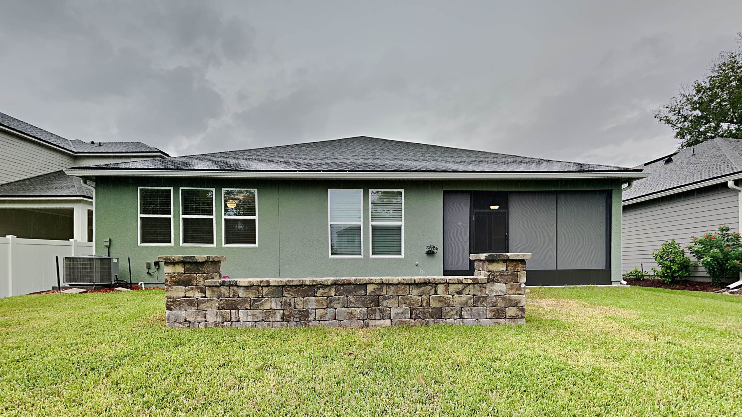 209 Cloverbrook Road St. Johns, FL 32259 - Photo 13 of 13 a front view of house with yard and outdoor seating