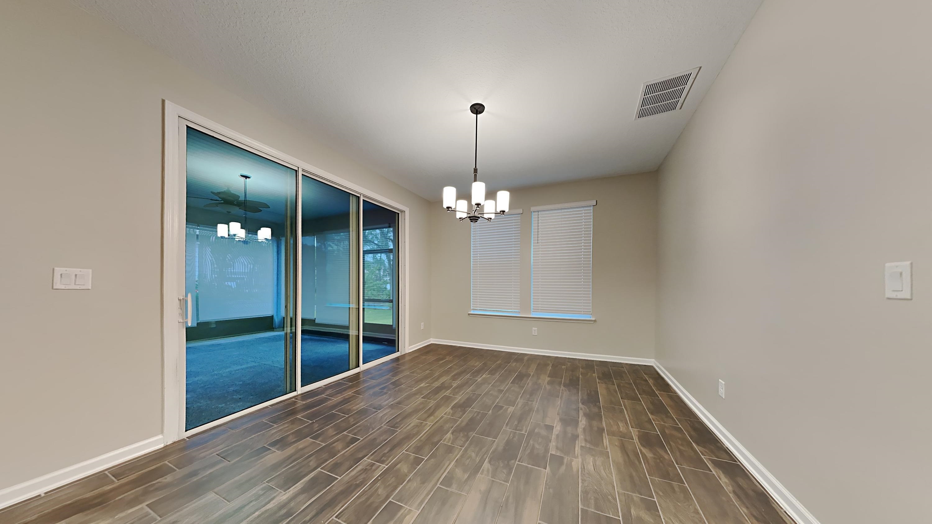 209 Cloverbrook Road St. Johns, FL 32259 - Photo 2 of 13 a view of empty room with wooden floor