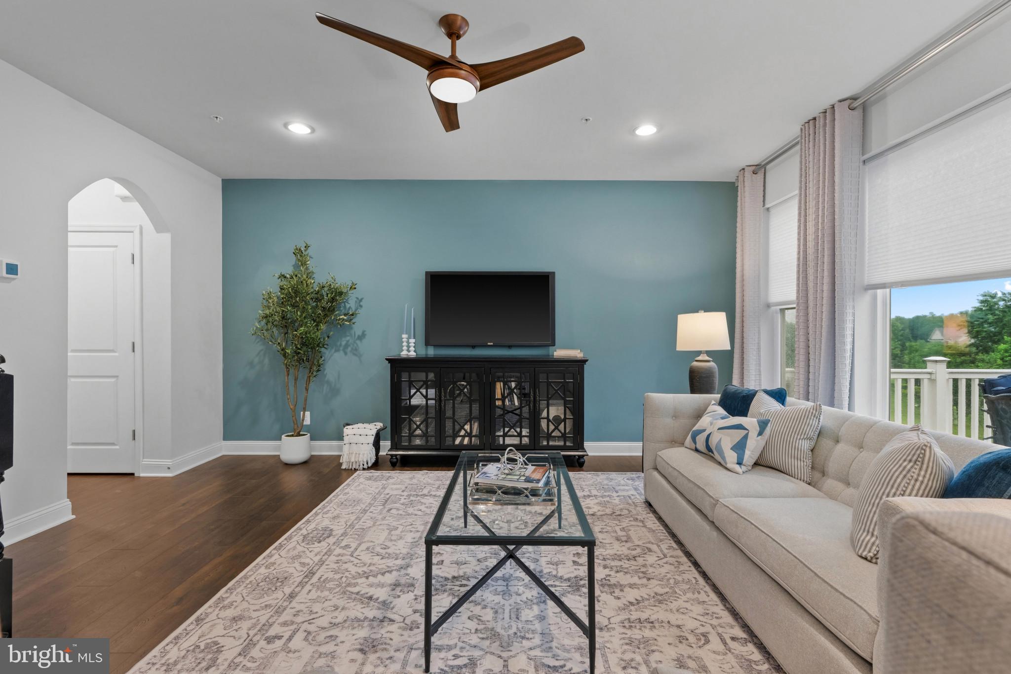 703 Perception Way Aberdeen, MD 21001 - Photo 3 of 42 a living room with furniture and a flat screen tv