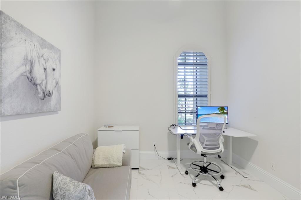 7323 Acorn Way Naples, FL 34119 - Photo 17 of 21 5th bedroom or office space with tile floors and high ceilings with closest