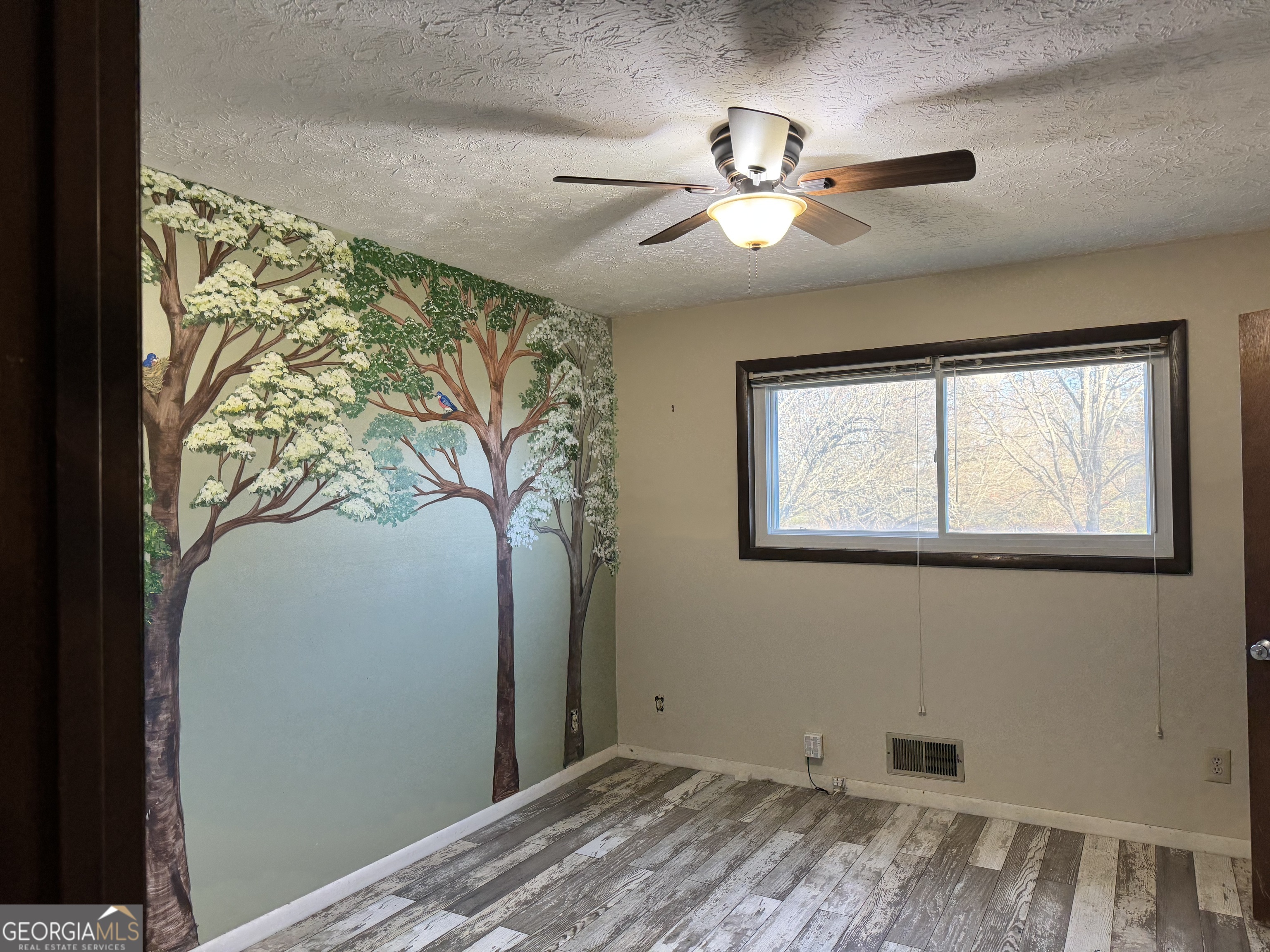 2324 Wilson Road Northwest Conyers, GA 30012 - Photo 11 of 13 a view of a livingroom with a window