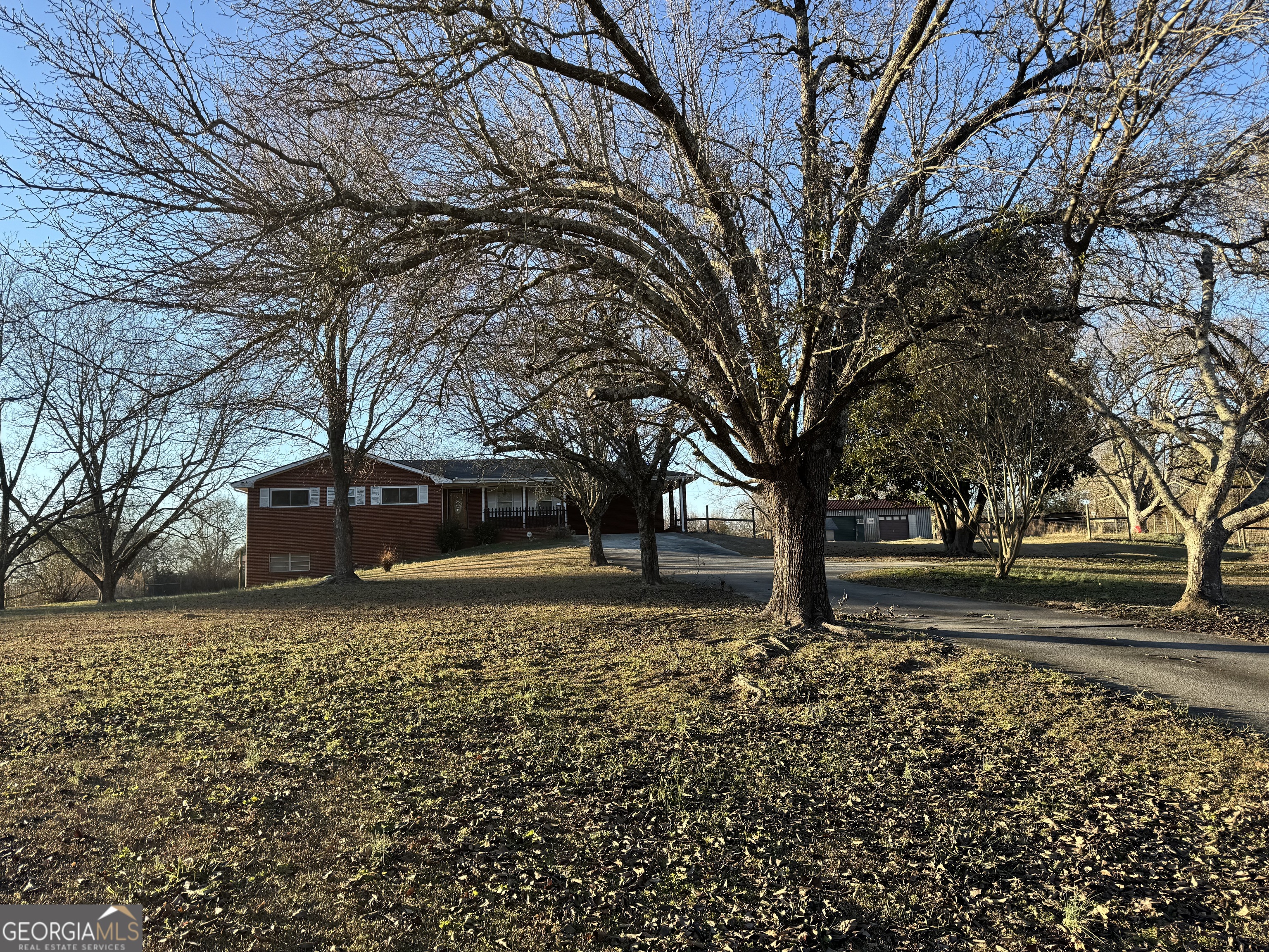 2324 Wilson Road Northwest Conyers, GA 30012 - Photo 2 of 13 a front view of a house with a yard