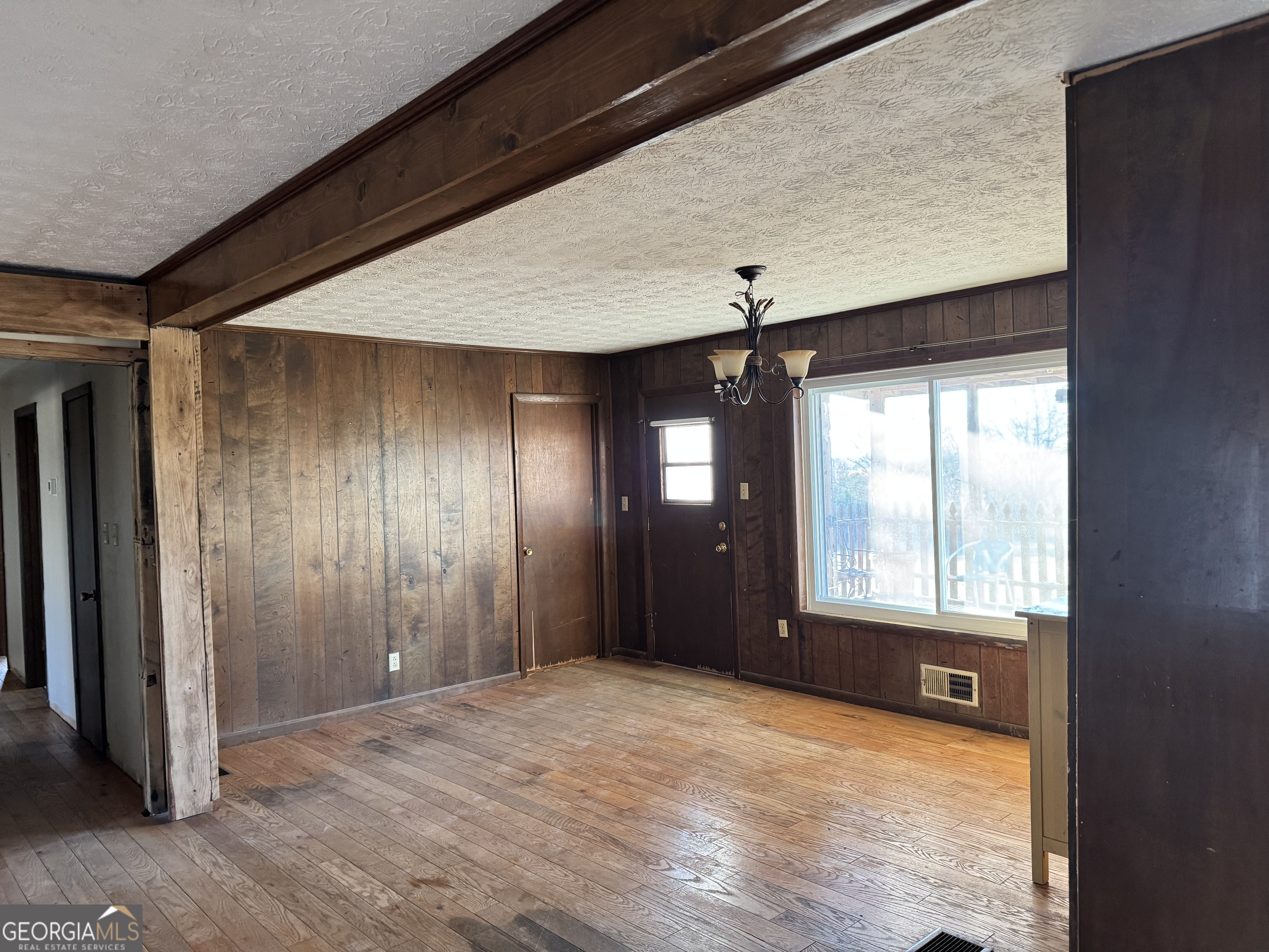 2324 Wilson Road Northwest Conyers, GA 30012 - Photo 7 of 13 a view of an empty room with a window