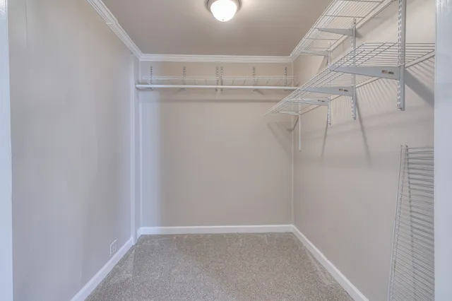 a view of a room with racks on the wall