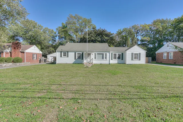 a house view with a garden space