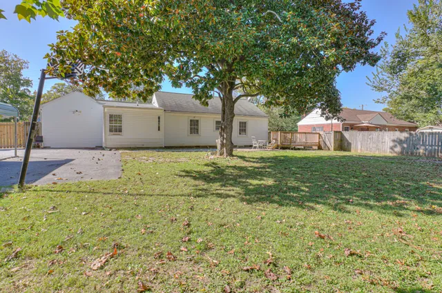 a house with garden in front of it