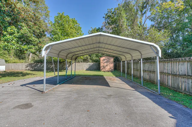 a view of backyard with green space