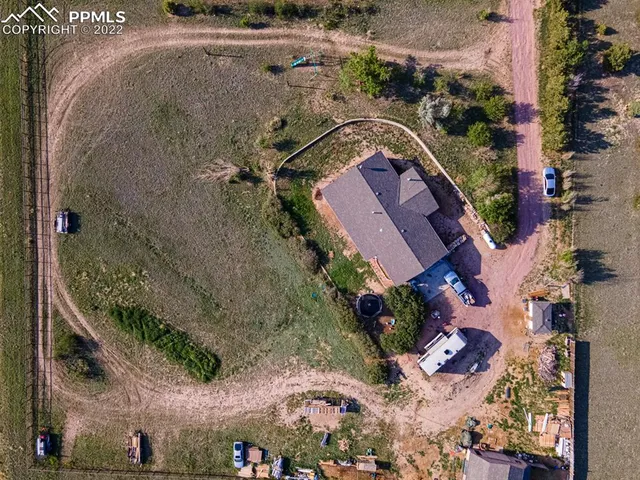 an aerial view of a city with ocean view