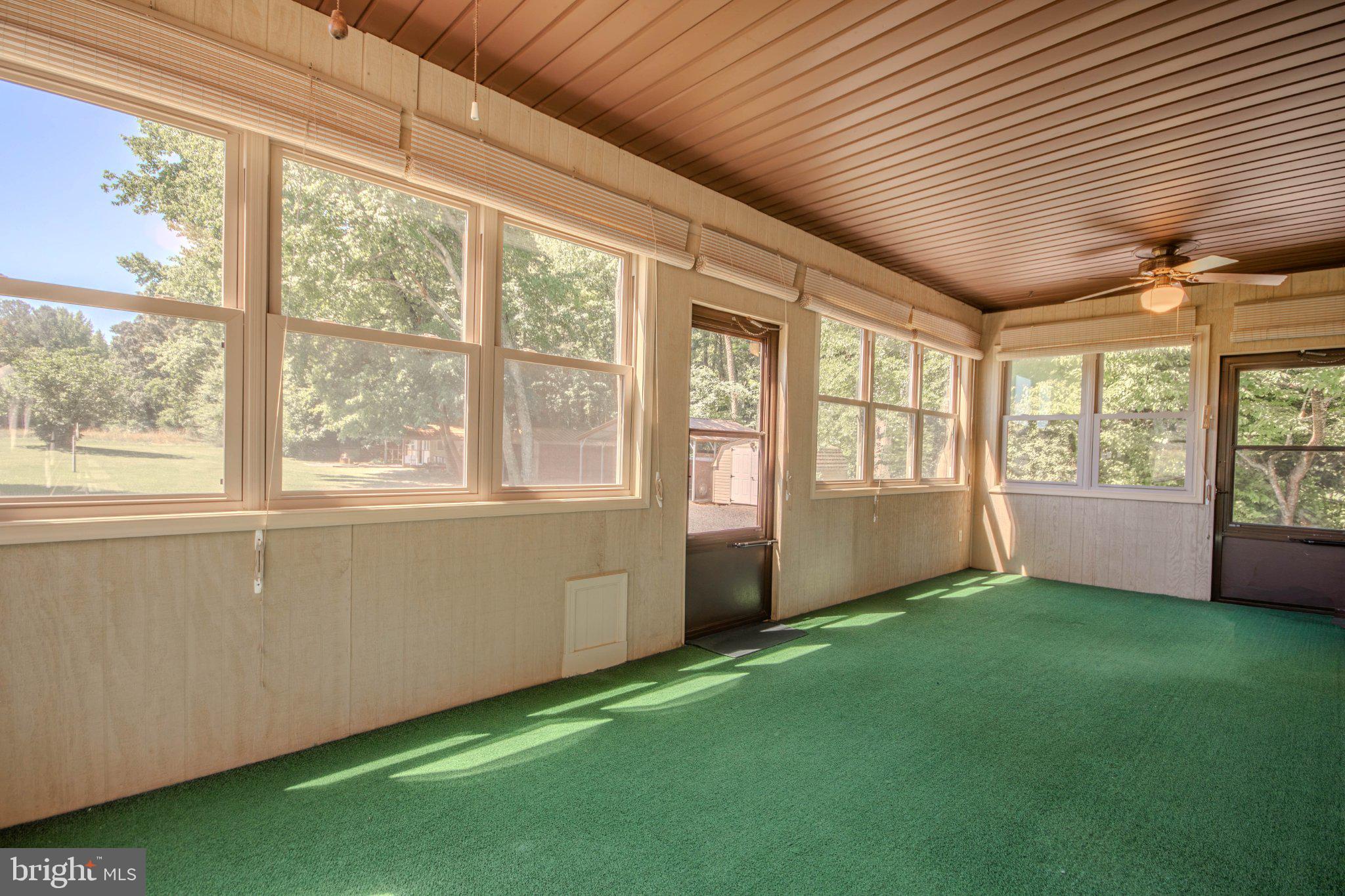 31749 Morris Leonard Road Parsonsburg, MD 21849 - Photo 24 of 40 Bright and airy sunroom retreat.
