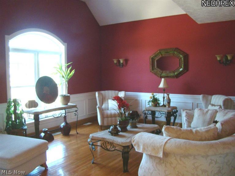 7315 Alexander Road Painesville, OH 44077 - Photo 5 of 18 Lucious Parlor with beautiful wood floors on first floor adjacent to entry.