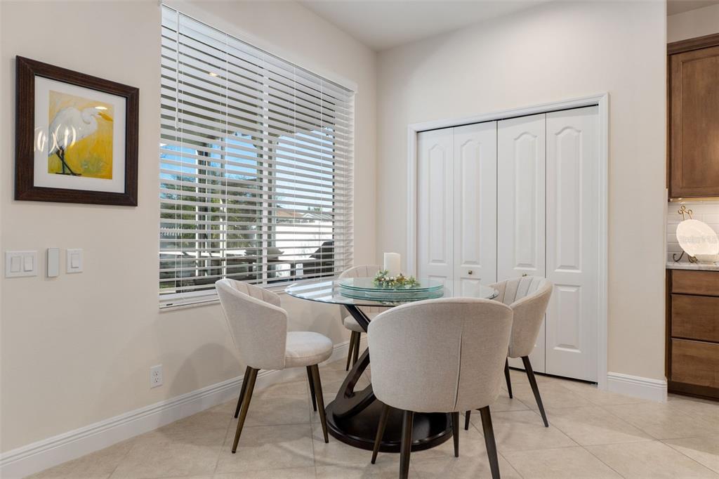 14617 Balloch Drive Hudson, FL 34667 - Photo 15 of 76 a view of a dining room with furniture and window