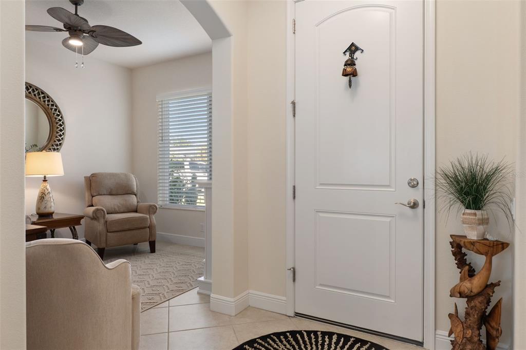 14617 Balloch Drive Hudson, FL 34667 - Photo 23 of 76 a living room with furniture and a window