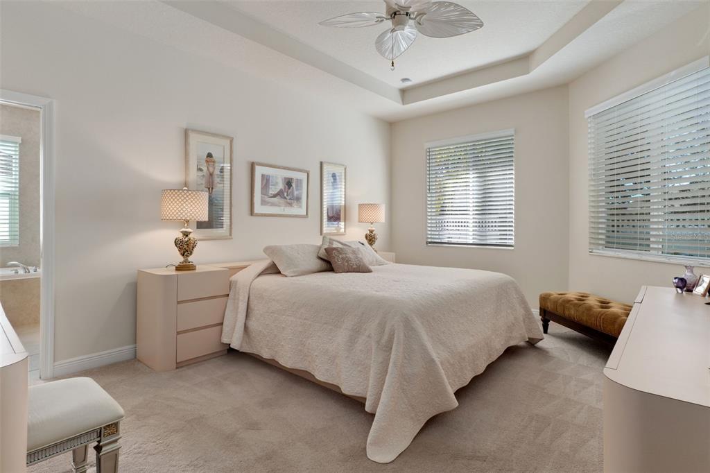 14617 Balloch Drive Hudson, FL 34667 - Photo 25 of 76 a bed room with a bed and a couch