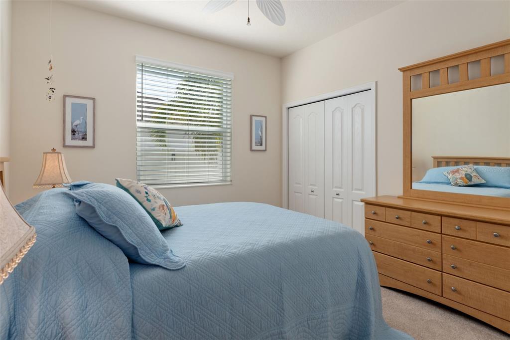 14617 Balloch Drive Hudson, FL 34667 - Photo 35 of 76 a bedroom with a bed and a dresser