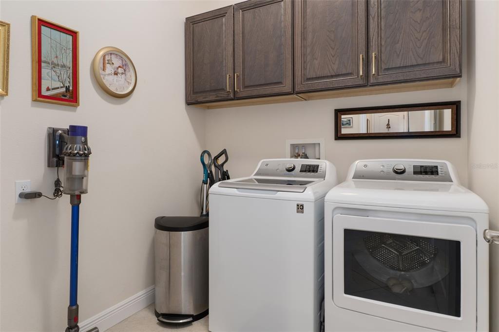 14617 Balloch Drive Hudson, FL 34667 - Photo 37 of 76 a utility room with dryer and washer