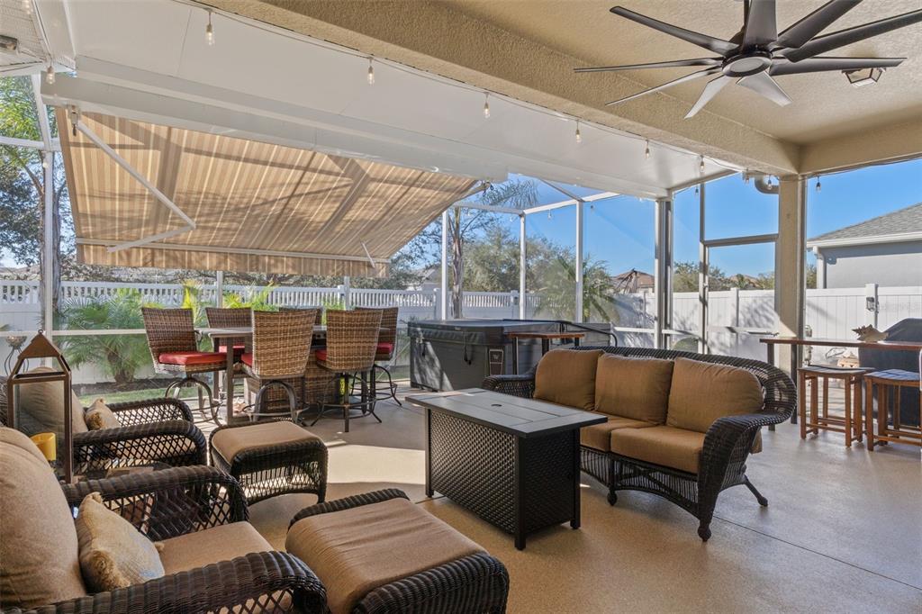 14617 Balloch Drive Hudson, FL 34667 - Photo 41 of 76 a living room with furniture and a large window