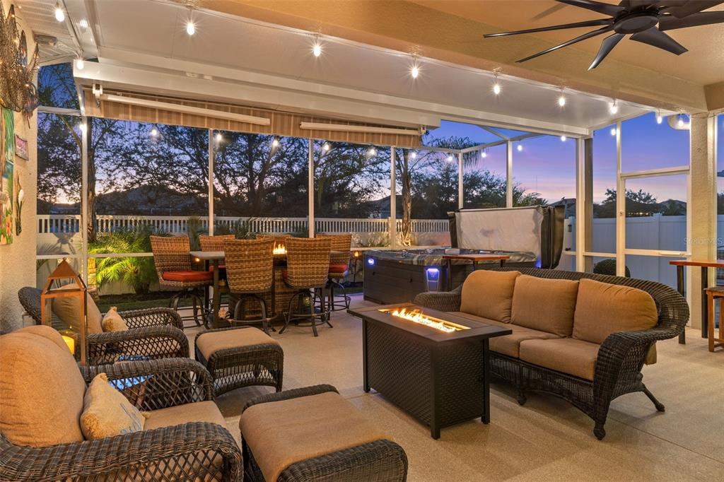 14617 Balloch Drive Hudson, FL 34667 - Photo 46 of 76 a outdoor living space with patio furniture and a potted plant