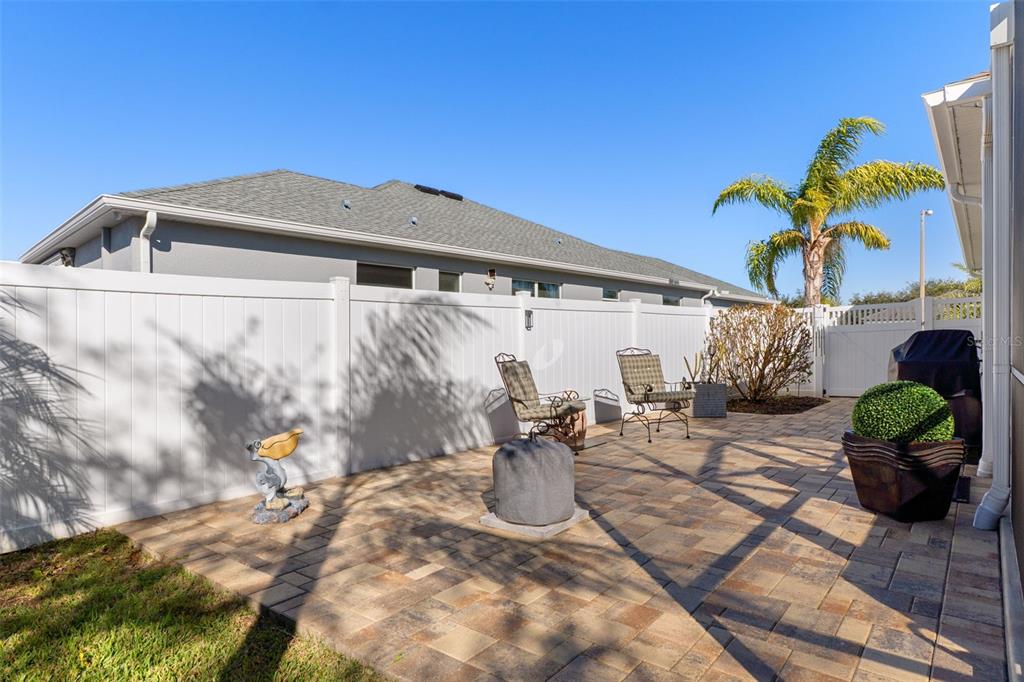 14617 Balloch Drive Hudson, FL 34667 - Photo 52 of 76 a front view of a house with patio