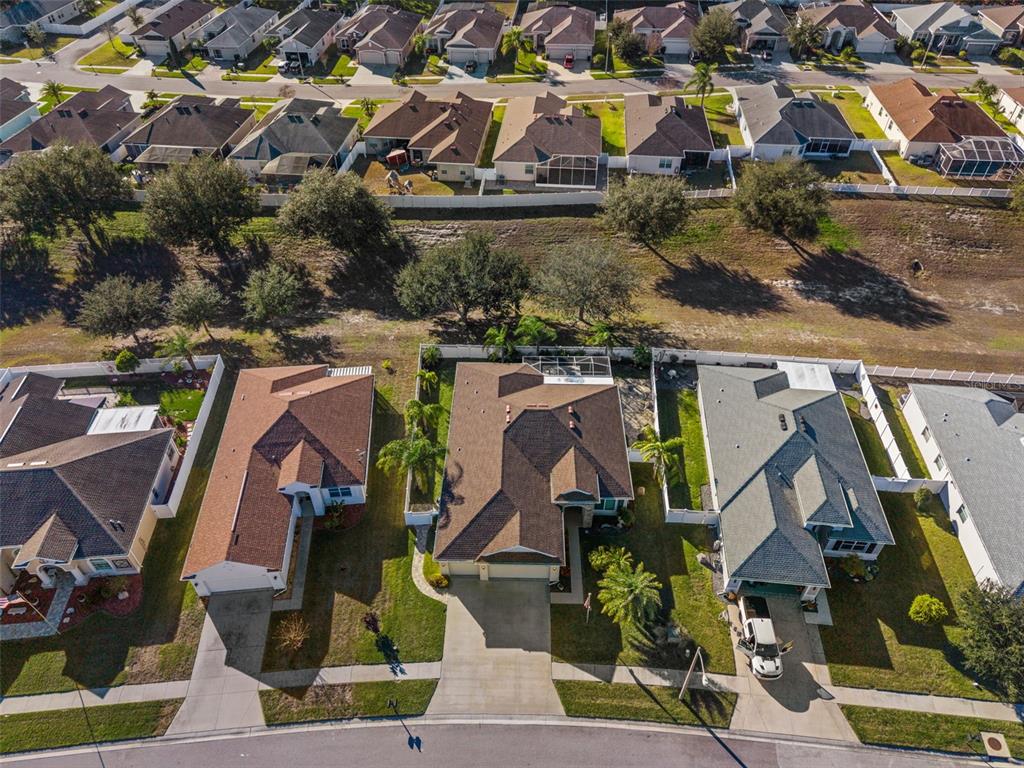 14617 Balloch Drive Hudson, FL 34667 - Photo 67 of 76 an aerial view of residential houses with outdoor space
