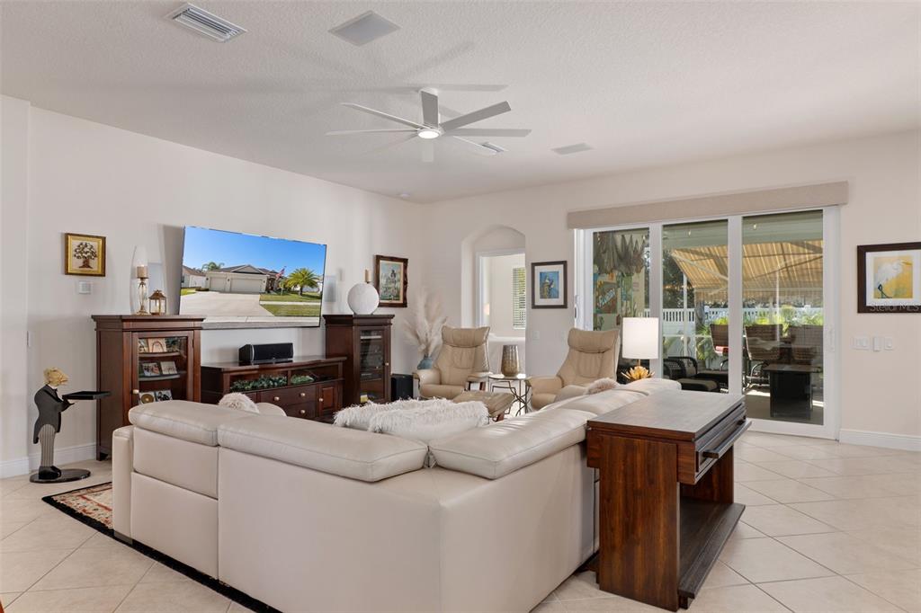 14617 Balloch Drive Hudson, FL 34667 - Photo 10 of 76 a living room with furniture and a large window