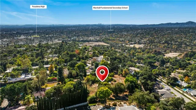 a view of a street with lots of trees