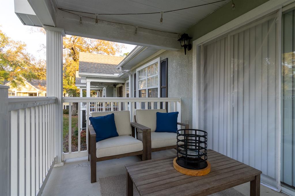 10000 Southwest 52nd Avenue, Unit 60 Gainesville, FL 32608 - Photo 25 of 36 a outdoor living space with furniture