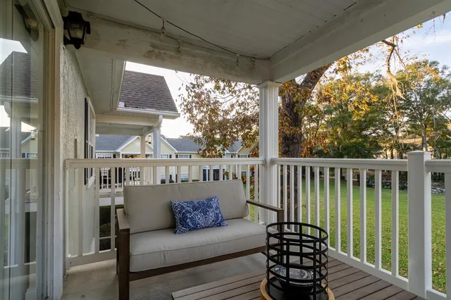 a view of a porch with furniture