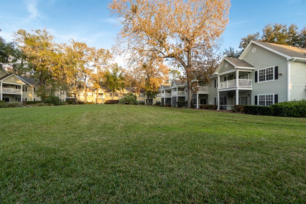 10000 Southwest 52nd Avenue, Unit 60 Gainesville, FL 32608 - Photo 27 of 36 a view of a house with a big yard