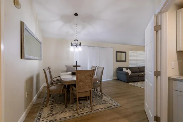 a view of a dining room with furniture