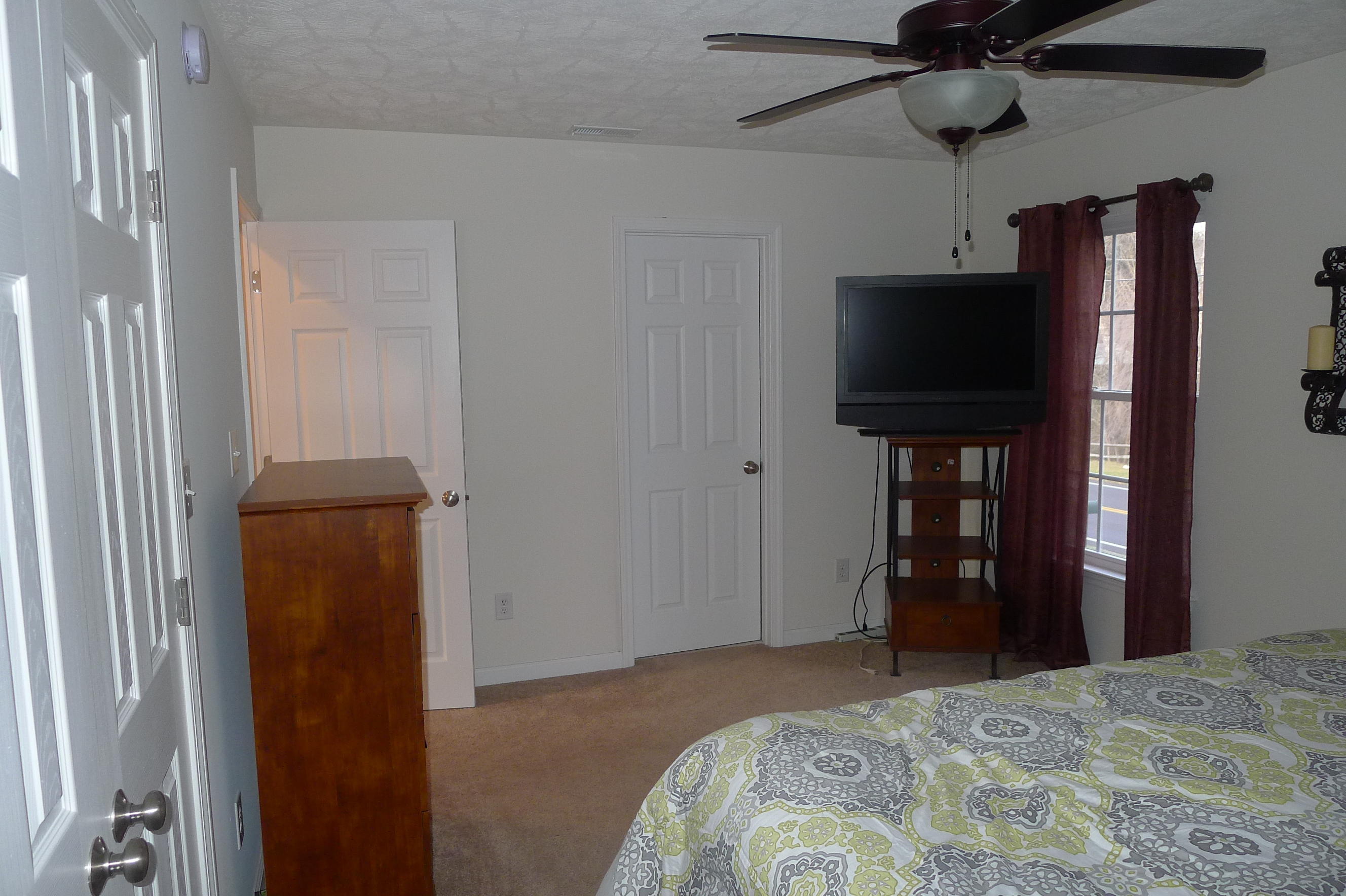 2850 Green Ridge Road Northwest Roanoke, VA 24019 - Photo 22 of 30 a bedroom with a bed and a television