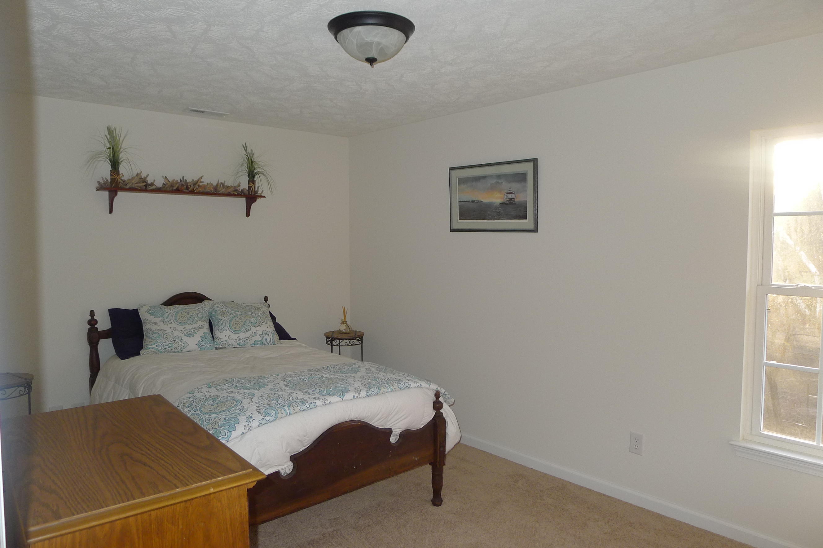 2850 Green Ridge Road Northwest Roanoke, VA 24019 - Photo 24 of 30 a bedroom with a bed and a window
