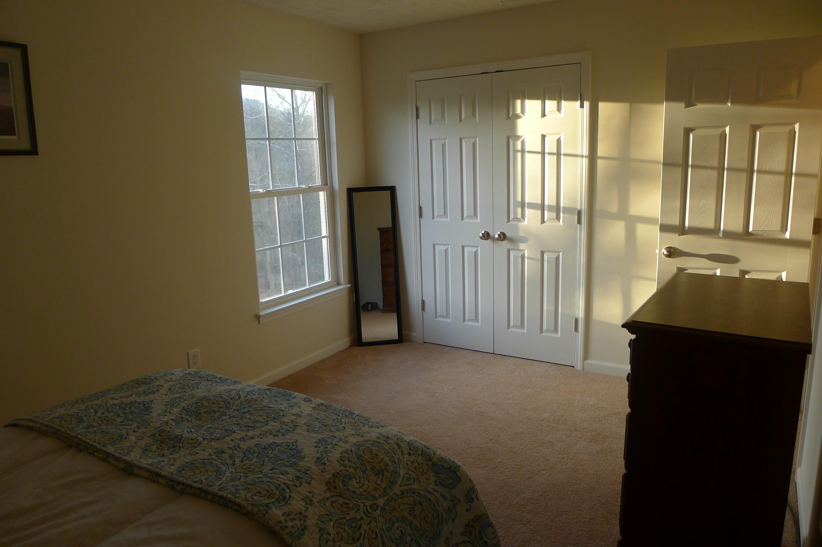 2850 Green Ridge Road Northwest Roanoke, VA 24019 - Photo 25 of 30 a bedroom with a bed and a window