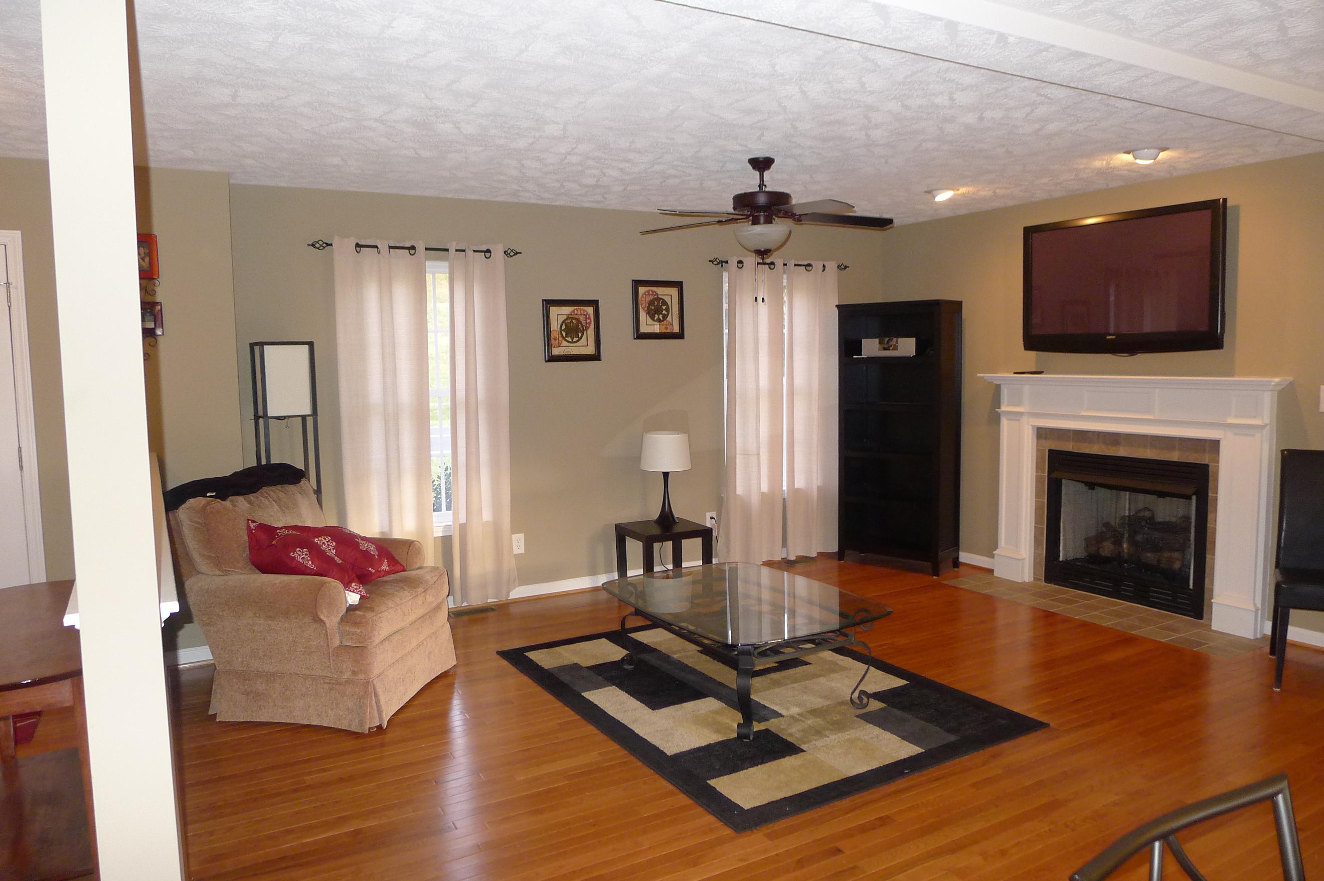 2850 Green Ridge Road Northwest Roanoke, VA 24019 - Photo 8 of 30 a living room with furniture fireplace and flat screen tv