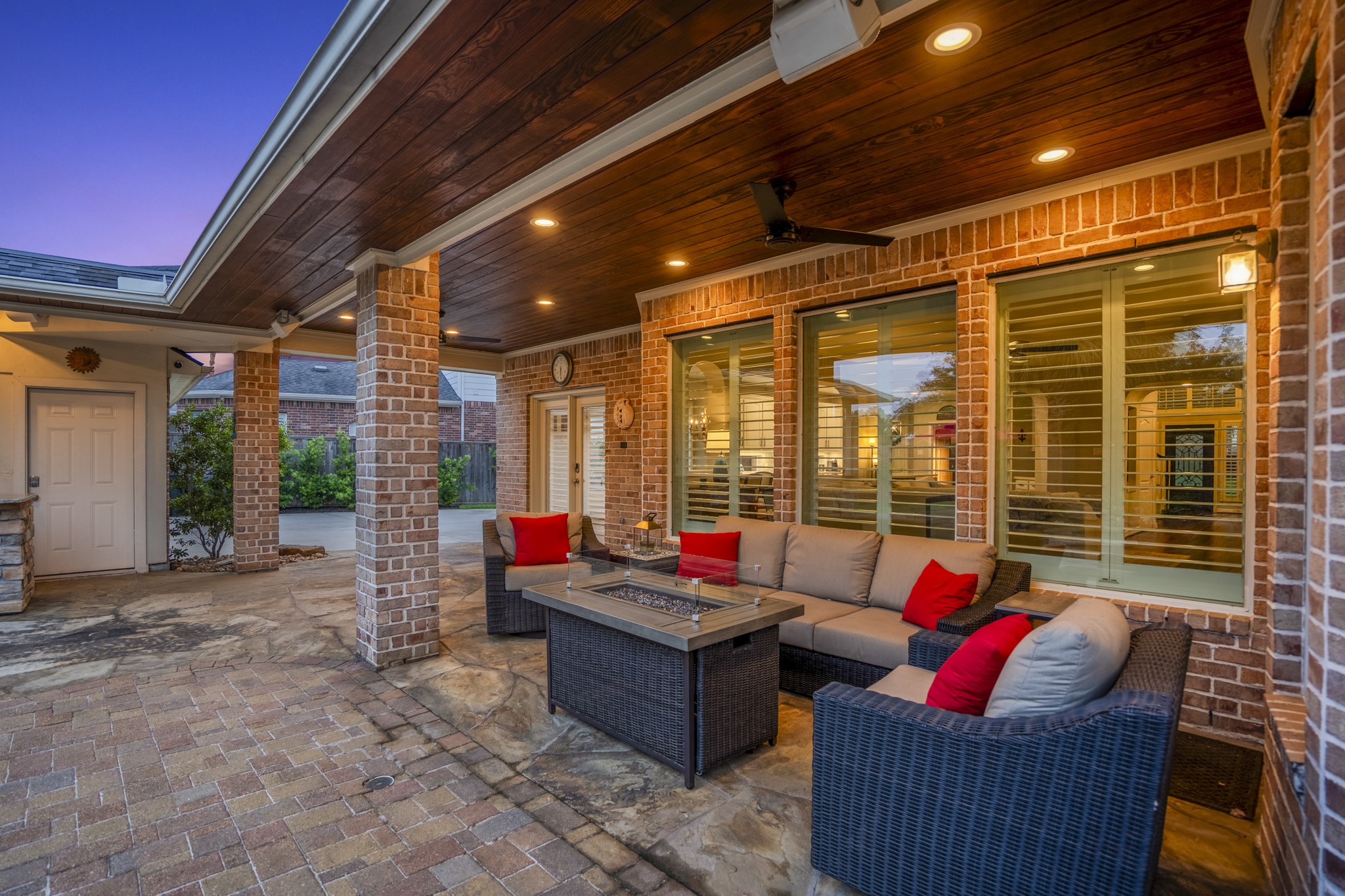 9707 Blue Cruls Way Spring, TX 77379 - Photo 4 of 50 a living room with patio furniture and a backyard