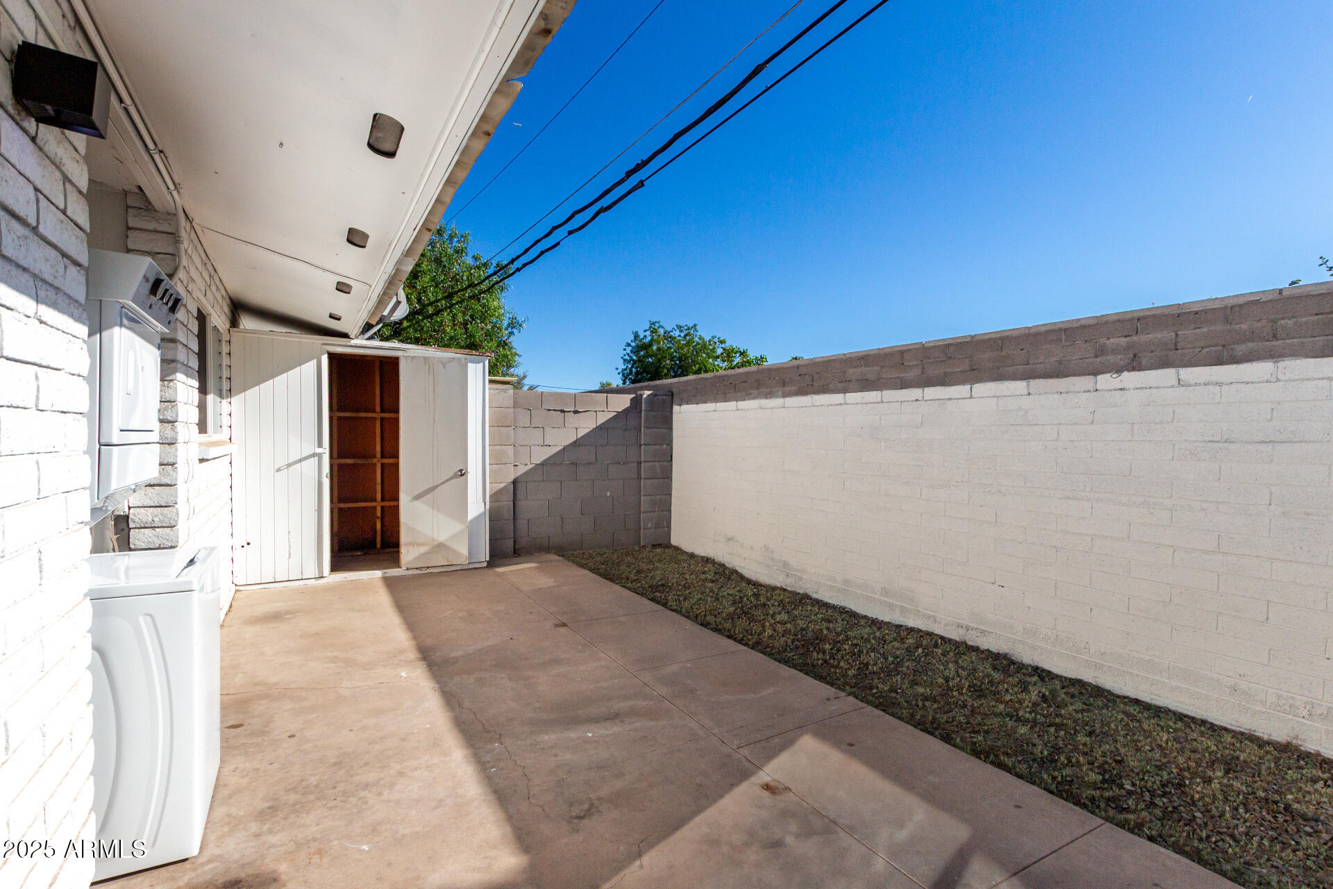 131 North Horne, Unit E Mesa, AZ 85203 - Photo 23 of 26 a view of back yard of the house