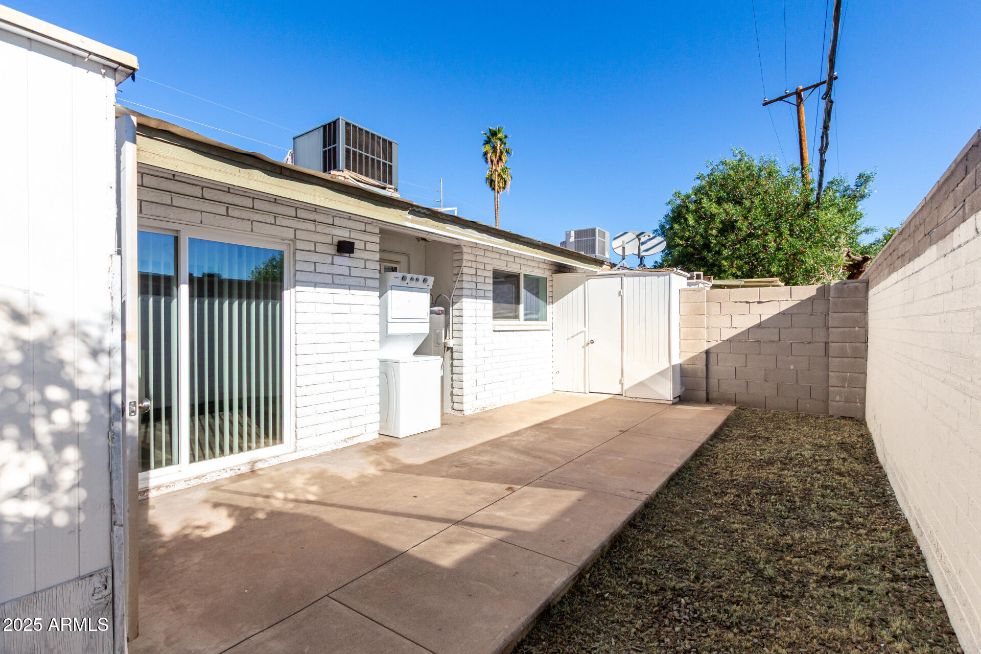 131 North Horne, Unit E Mesa, AZ 85203 - Photo 25 of 26 a view of a house with backyard