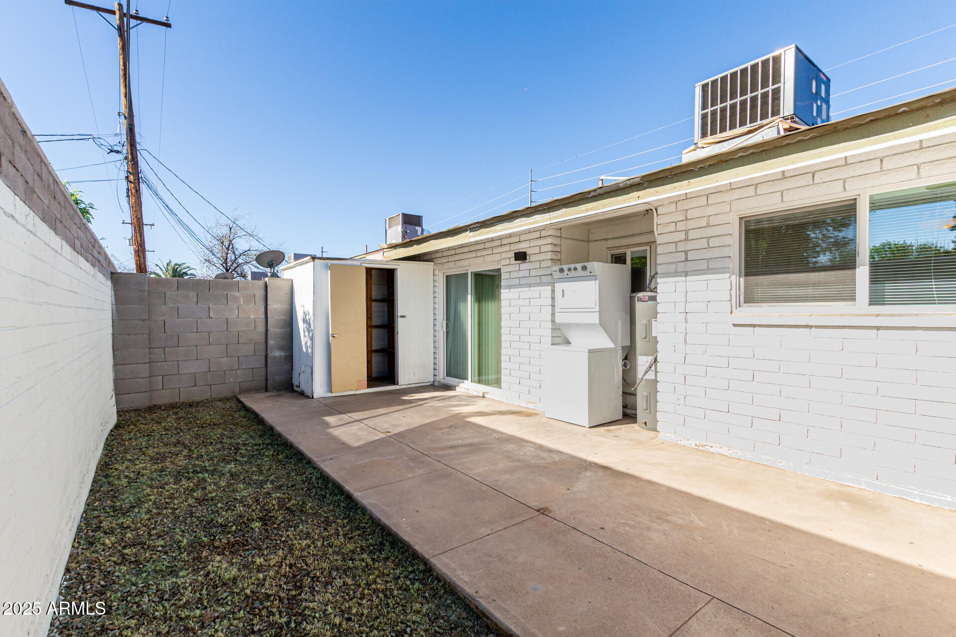 131 North Horne, Unit E Mesa, AZ 85203 - Photo 26 of 26 a view of a back yard of the house