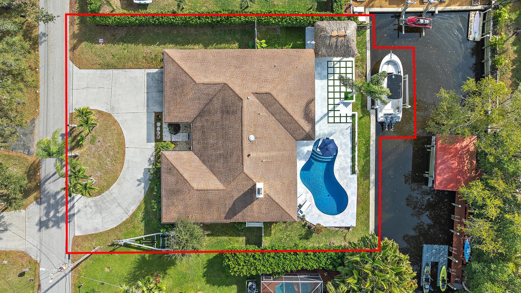 9524 Southeast Cove Point Street Jupiter, FL 33469 - Photo 33 of 35 an aerial view of a house
