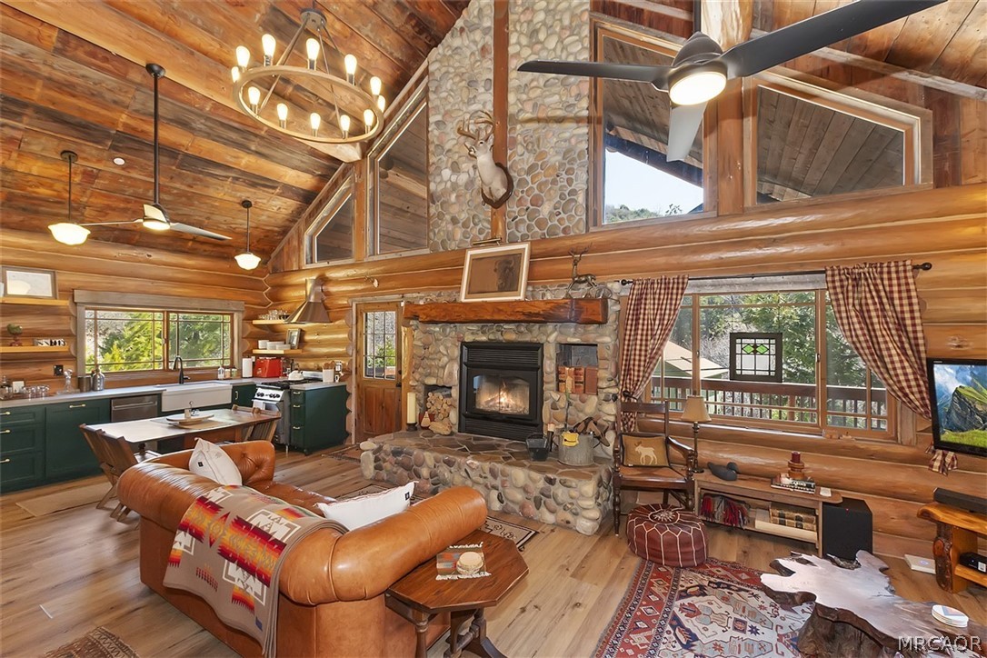 29632 Hook Creek Road Cedar Glen, CA 92321 - Photo 4 of 43 a building outdoor space with patio furniture and a fireplace
