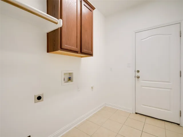 a view of a room with white walls