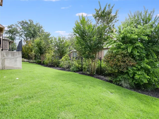 a view of a backyard with a garden