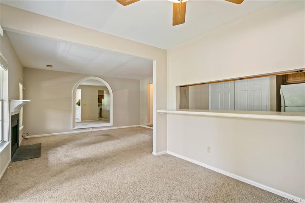 20109 Henderson Road, Unit A Cornelius, NC 28031 - Photo 13 of 25 a view of an empty room with a window