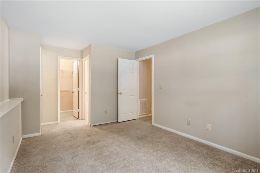 20109 Henderson Road, Unit A Cornelius, NC 28031 - Photo 17 of 25 an empty room with windows